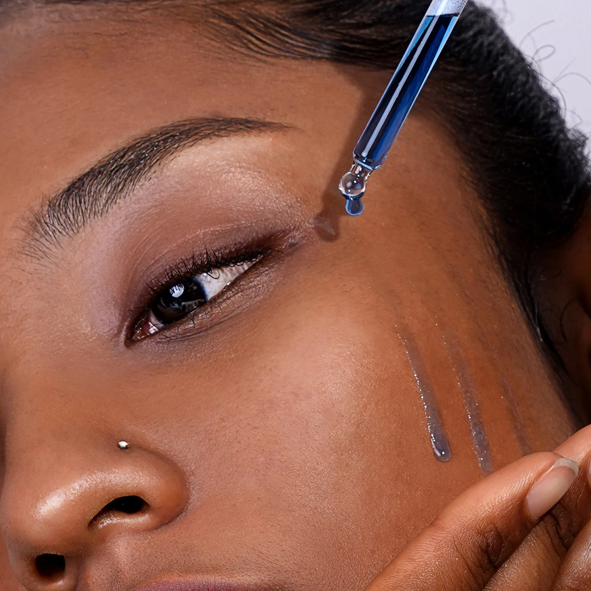 dear Klairs Midnight Blue Youth Activating Drop 20mL | Korean anti-aging serum for sensitive and oily skin in Dubai, UAE. on skin