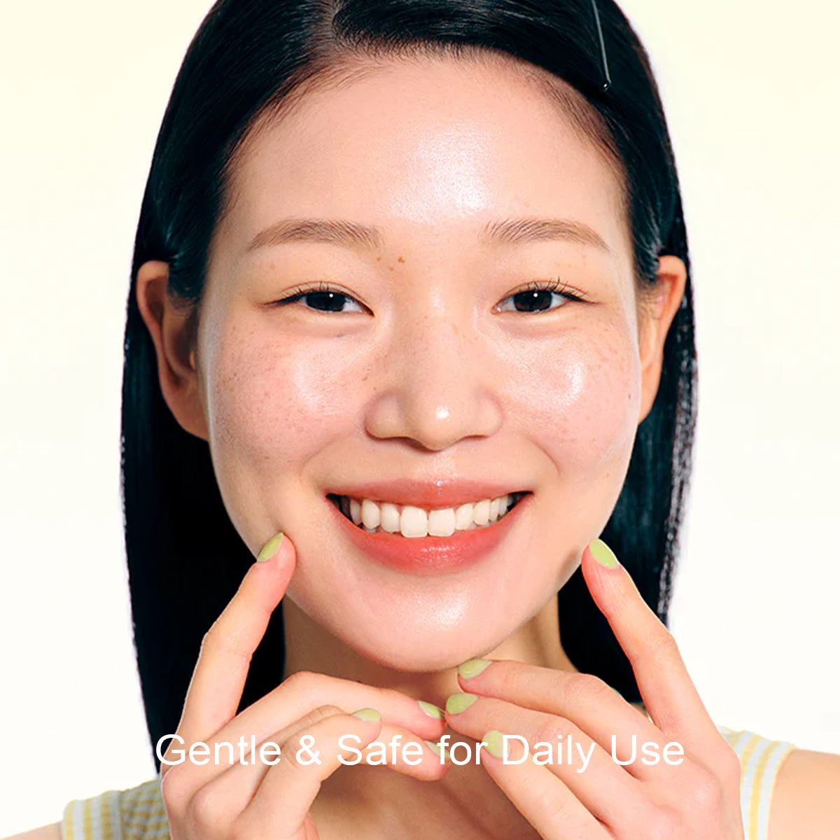 Woman with smooth skin touching her face, with text 'Gentle & Safe for Daily Use' on a light background