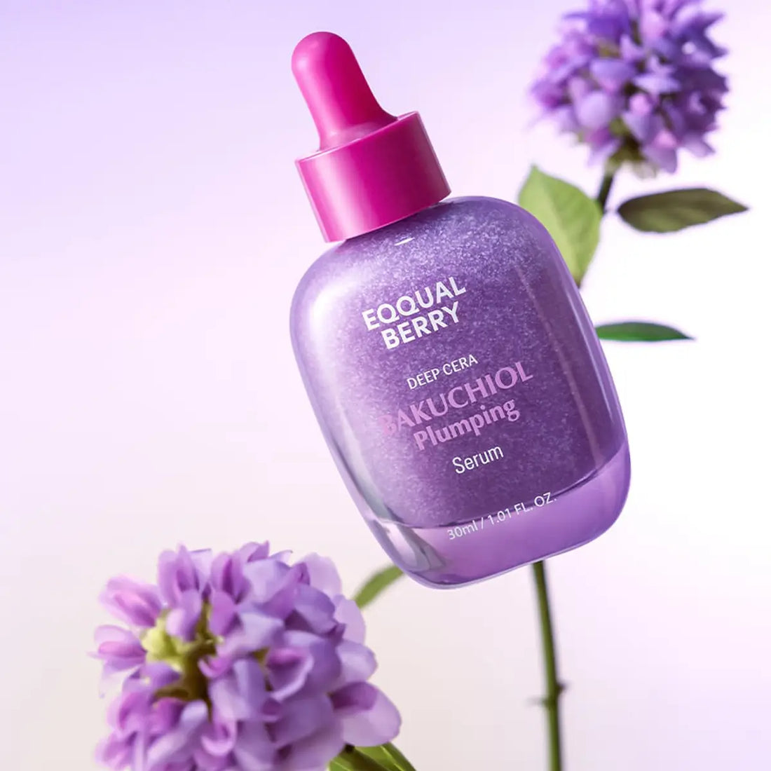 Eqqualberry Bakuchiol Plumping Serum bottle with pink dropper labeled 'Equal Berry' on a light purple background with flowers.